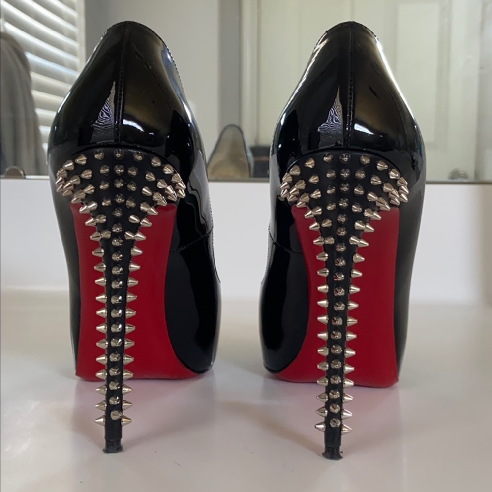 Christian Louboutin spiked heels in black